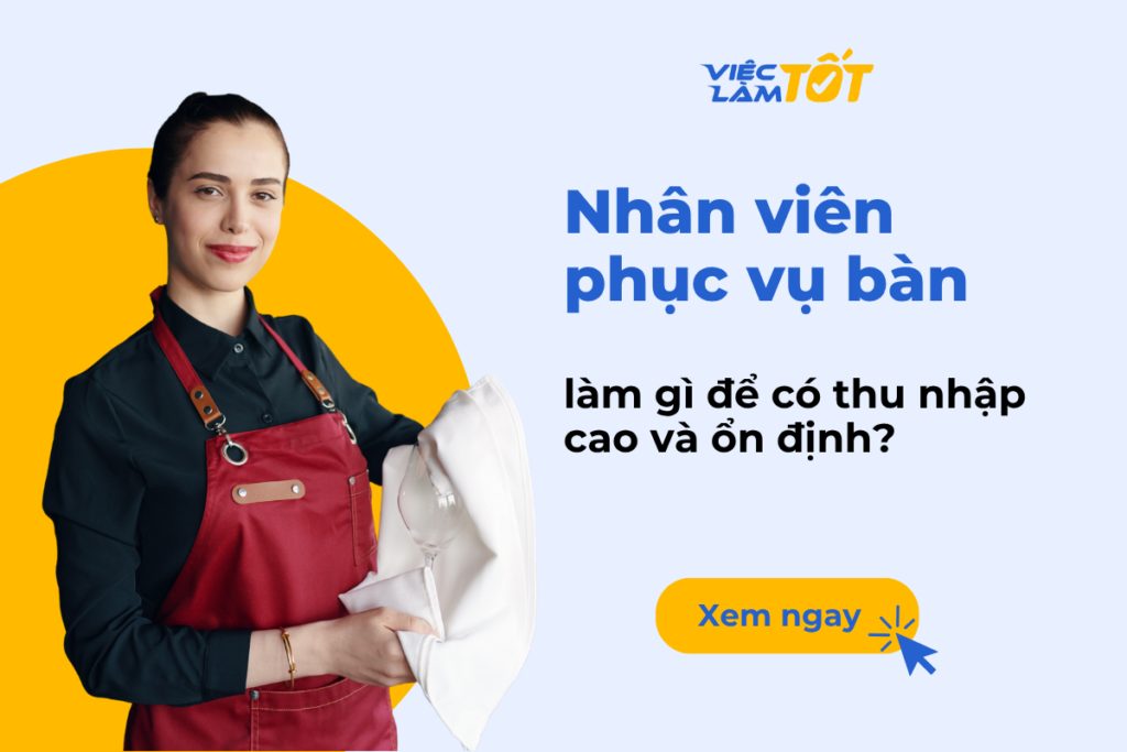 Hình ảnh nhân viên phục vụ bàn đang tươi cười đón tiếp khách hàng tại nhà hàng sang trọng