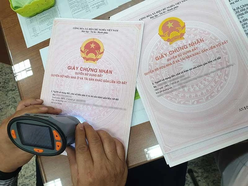 Thủ tục tách sổ đỏ cho con 1