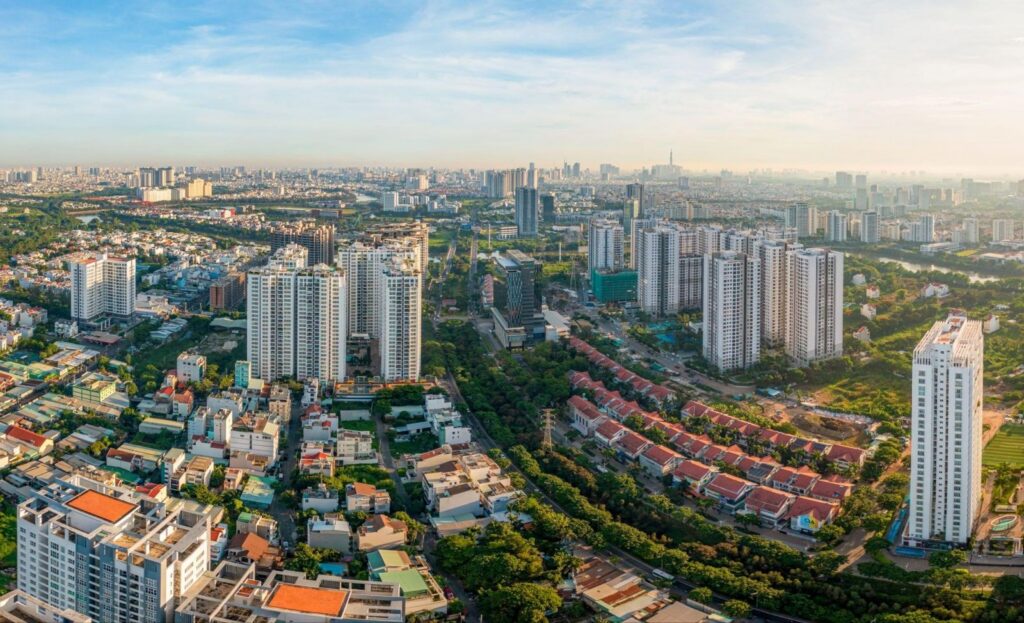 Toàn cảnh khu đô thị với nhiều tòa chung cư cao tầng, nhà phố và đường giao thông nhìn từ trên cao