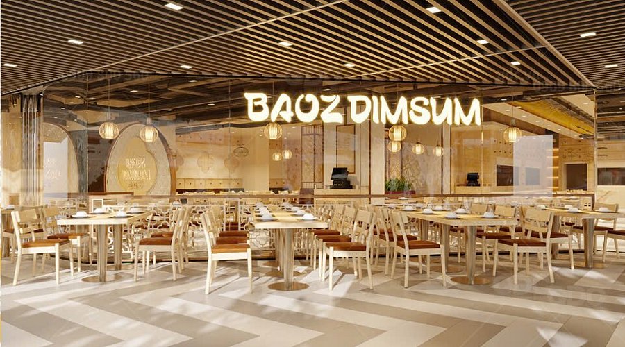 Mặt tiền nhà hàng Baoz Dimsum với kiến trúc hiện đại, biển hiệu chữ nổi lớn và hệ thống cửa kính suốt tầng trệt.