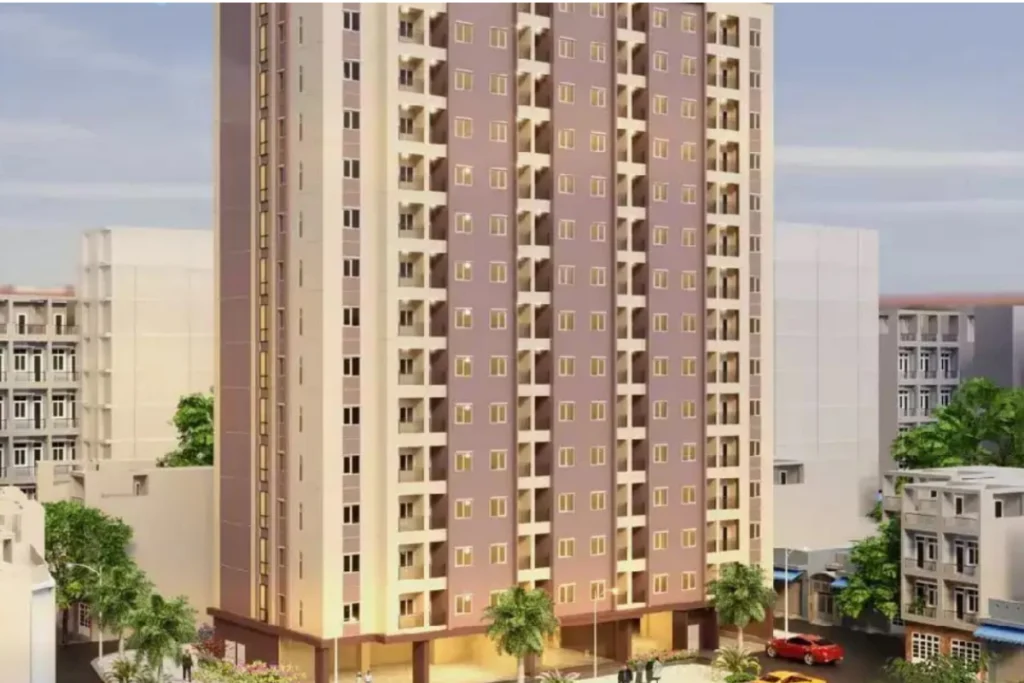 hối cảnh dựng hình 3D trực diện một tòa nhà chung cư đơn khối cao tầng mang tông màu nâu nhạt pha kem, thiết kế mặt đứng có nhiều ô cửa sổ kính nhỏ
