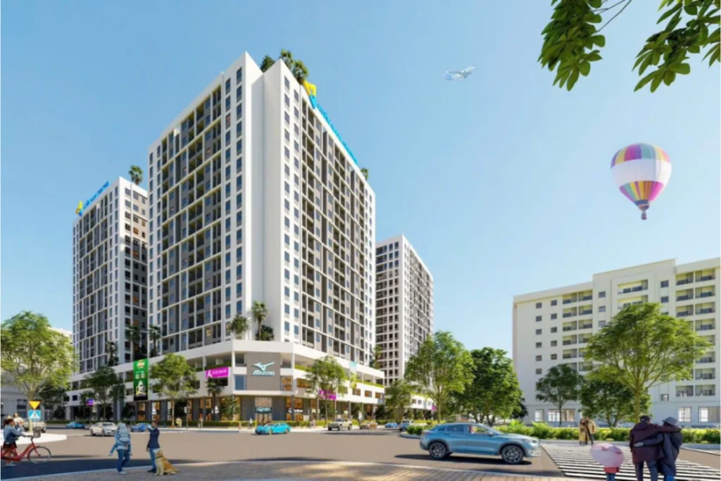Phối cảnh 3D góc nhìn từ ngã tư đường phố lên các tòa nhà căn hộ thiết kế khối hộp vuông vức mang tông trắng xám hiện đại, tầng trệt tích hợp shophouse thương mại lớp kính lớn