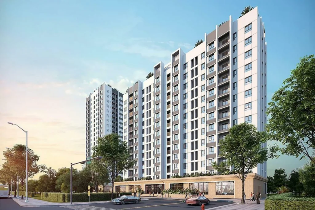 Tòa nhà chung cư cao tầng khang trang với thiết kế ô cửa sổ thông thoáng bên cạnh con đường sạch đẹp, hình ảnh minh họa cho quy trình xét duyệt hồ sơ NOXH