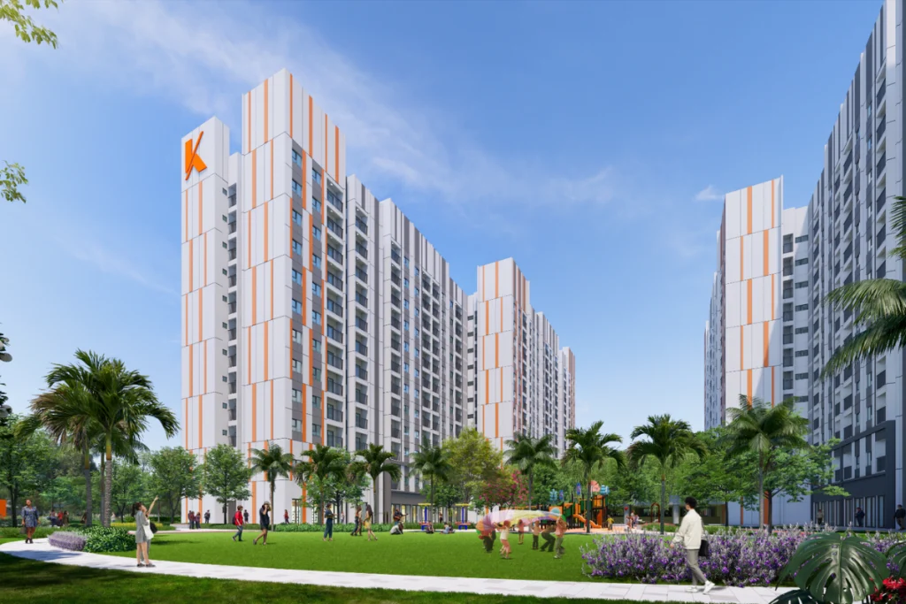 Cư dân và trẻ em vui chơi trên bãi cỏ xanh rộng lớn trước các tòa nhà chung cư cao tầng hiện đại, hình ảnh minh họa giải thích vì sao bị rớt hồ sơ nhà ở xã hội