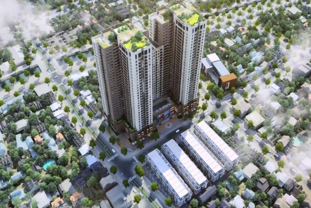 Phối cảnh góc nhìn từ trên cao xuống một dự án chung cư cao tầng hiện đại gồm nhiều tòa tháp được kết nối vuông góc