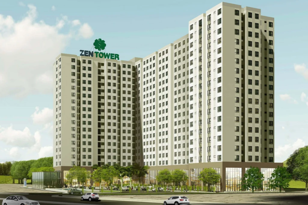 Phối cảnh 3D tòa nhà chung cư cao tầng Zen Tower sơn màu trắng kem hiện đại với logo bông hoa xanh lá và dòng chữ ZEN TOWER nổi bật