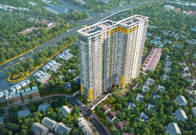 Phối cảnh từ trên cao chung cư Bcons Polygon Bình Dương phối màu vàng xám hiện đại, bao quanh bởi khu dân cư thấp tầng và tuyến đường cao tốc